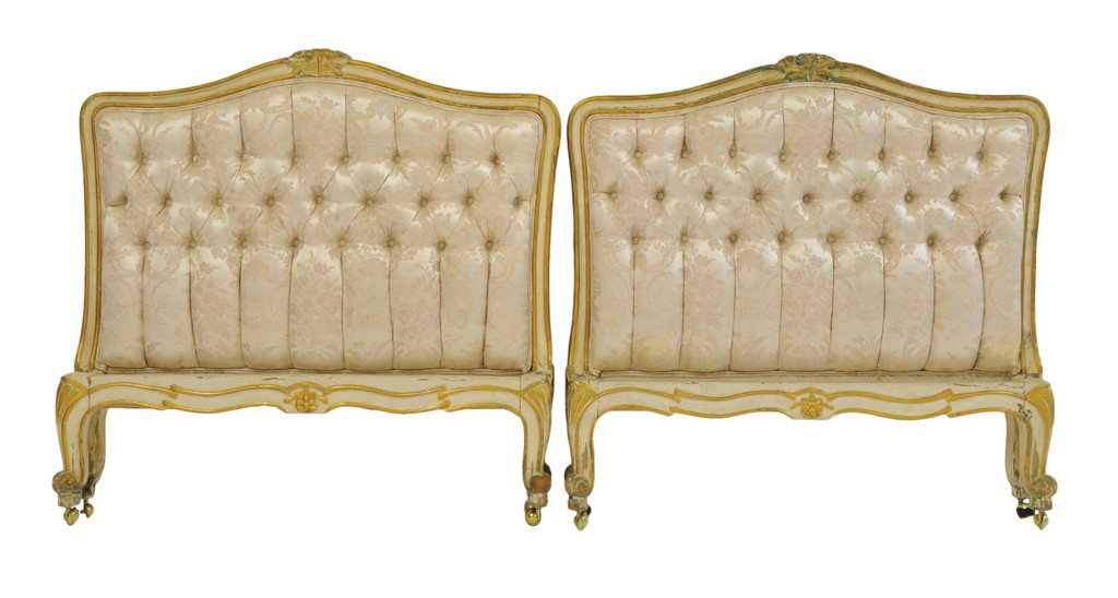 A PAIR OF CREME PAINTED AND TUFTED SINGLE BED FRAME: A PAIR OF CREME PAINTED AND TUFTED SINGLE BED FRAMES The Proctor Estate Width: 40 inches