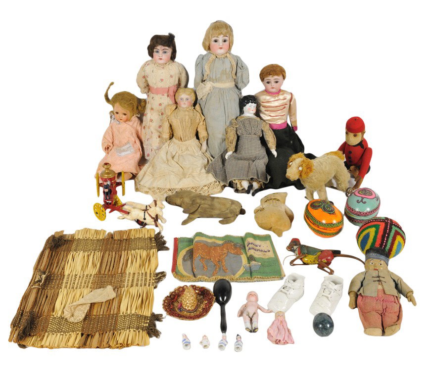 A LOT OF DOLLS AND TOYS: A LOT OF DOLLS AND TOYS The Proctor Estate The lot consisting of antique dolls, doll parts, doll clothes, stuffed animals, and toys. 19½ x 6 x 3 inches