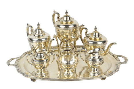 A SEVEN-PIECE SANBORNS STERLING SILVER COFFEE AND TE: A SEVEN-PIECE SANBORNS STERLING SILVER COFFEE AND TEA SERVICE Mexico The set consisting of a cream pitcher, a covered sugar bowl, a waste bowl, a teapot, a coffee pot, a hot water pot on a stand with