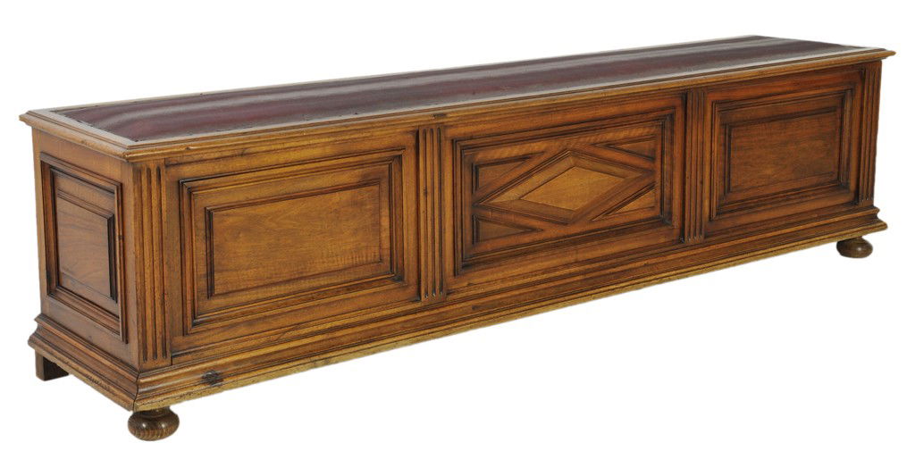 A LOUIS XIII STYLE CARVED WALNUT DIAMOND POINT CAS: A LOUIS XIII STYLE CARVED WALNUT DIAMOND POINT CASSONE Italy, Early 20th Century The carved walnut cassone with three front panels, the central one with a raised diamond; set on a step molded plinth r