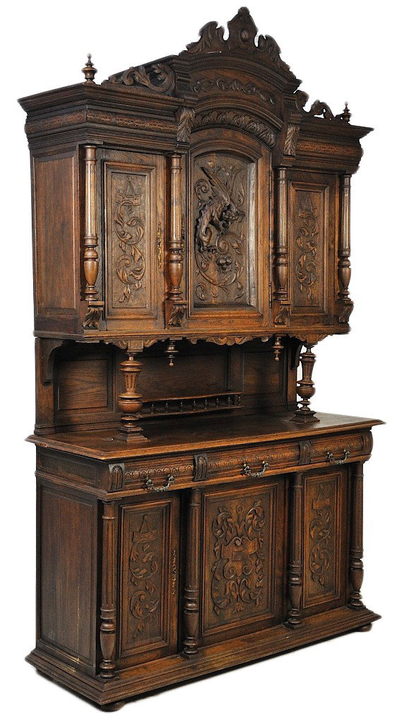 A HENRI II WALNUT BUFFET WITH EXTRAORDINARY CARVING: A HENRI II WALNUT BUFFET WITH EXTRAORDINARY CARVINGS 101 x 59½ x 21 inches