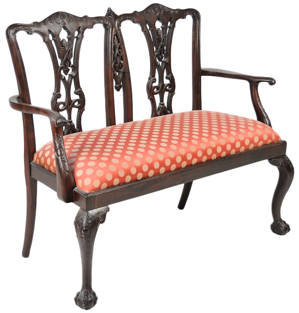 A TWO SEAT CHIPPENDALE STYLE SETTEE: A TWO SEAT CHIPPENDALE STYLE SETTEE A vintage reproduction. 40 x 46 x 18 inches