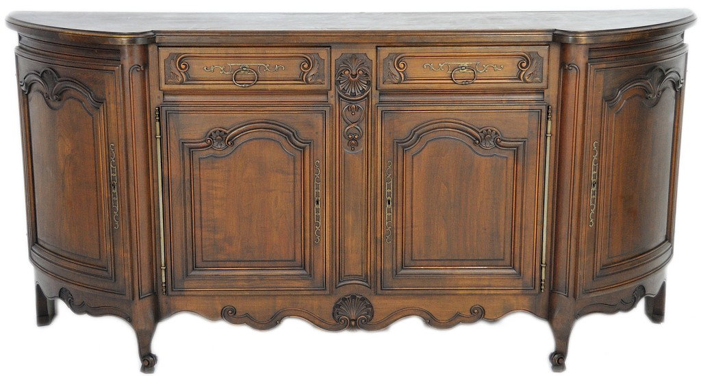 A GOOD LOUIS XV DEMI LUNE SHAPED WALNUT SIDEBOARD: A GOOD LOUIS XV DEMI LUNE SHAPED WALNUT SIDEBOARD Late 19th/ Early 20th century. Shaped and scalloped door panels along with shell and foliate motif carvings enhance this beautiful piece. Two central 