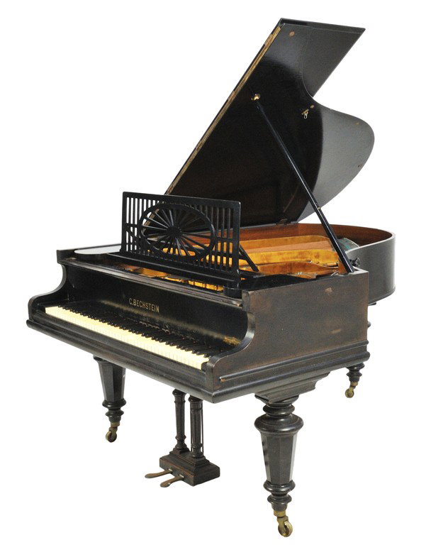 A C. BECHSTEIN BLACK LACQUER GRAND PIANO, Berlin, C: A C. BECHSTEIN BLACK LACQUER GRAND PIANO, Berlin, Circa 1904 Serial No. 21013 on case and 64187 on the frame. Features a pierced Adams oval music stand supported by a black lacquer case raised on tape