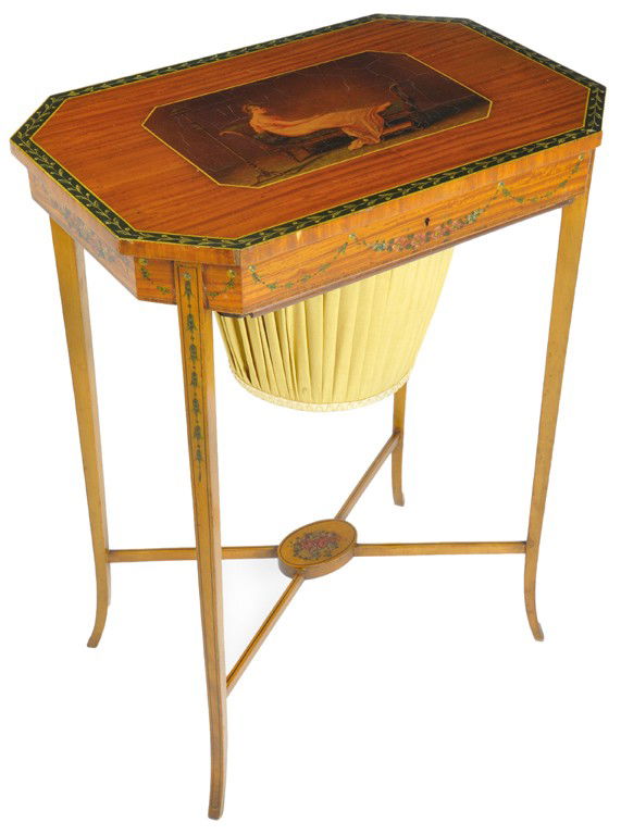 A CHARLES X SATINWOOD WORK TABLE WITH PAINTED RESE: A CHARLES X SATINWOOD WORK TABLE WITH PAINTED RESERVE AND DETAIL, England, 19th Century The rectangular top with canted corners features a hand painted reserve of a maiden reclining on a daybed with a