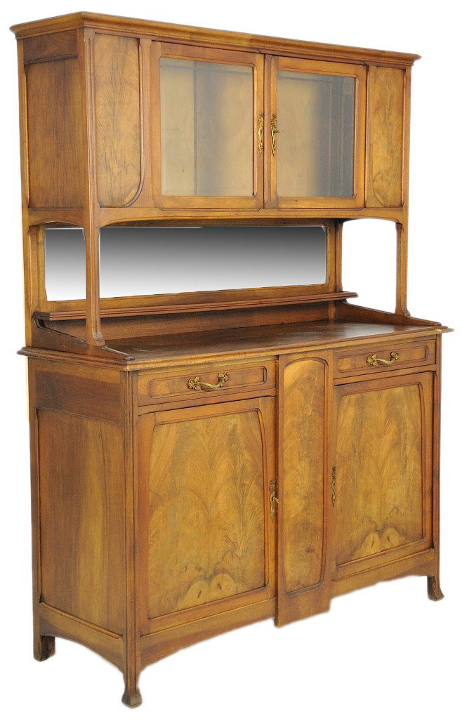 EARLY 20TH CENTURY ART NOUVEAU SIDEBOARD IN WALNU: EARLY 20TH CENTURY ART NOUVEAU SIDEBOARD IN WALNU The clean lines of the frame serve as subtle accents to the fancy walnut veneers. The bold pattern of the walnut has been carefully chosen and applied