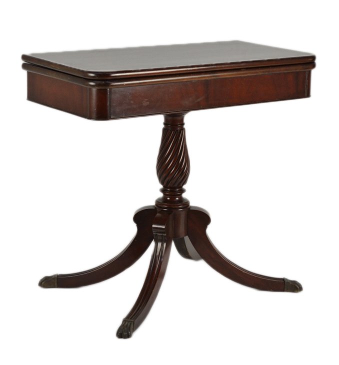 A PETITE SHERATON STYLE MAHOGANY FLIP TOP TABLE: A PETITE SHERATON STYLE MAHOGANY FLIP TOP TABLE The base having a turned vase form upright with spiral fluting. Hairy paw furrells cap the feet. Condition: 28½ x 32 x 32 inches