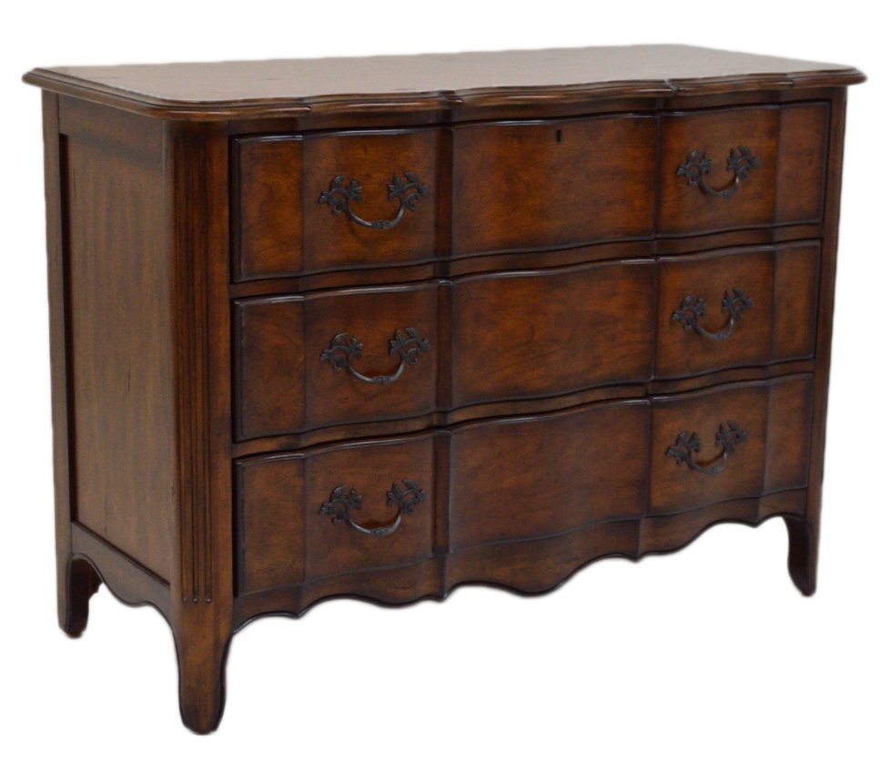 A FRENCH PROVINCAL THREE DRAWER COMMODE BY THOMASVI: A FRENCH PROVINCAL THREE DRAWER COMMODE BY THOMASVILLE Shaped and scalloped front. 34½ x 48 x 21 inches
