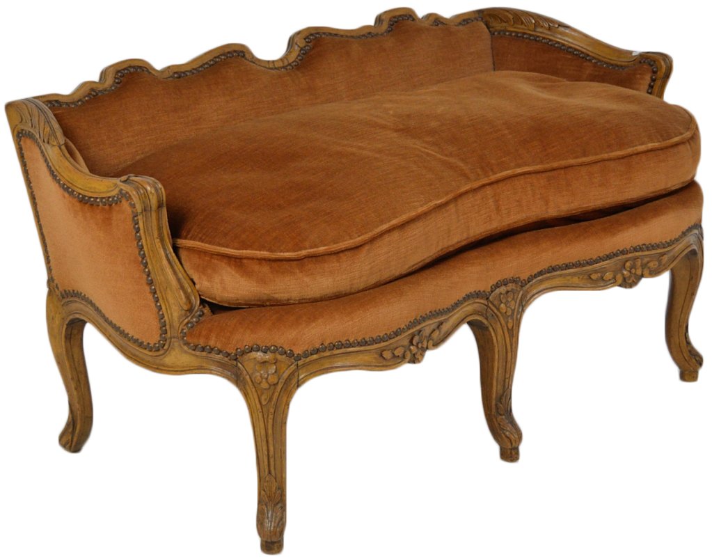 A WHIMSICAL LOUIS XV STYLE WALNUT BENCH: A WHIMSICAL LOUIS XV STYLE WALNUT BENCH The intricately shaped rail features acanthus relief carving at the corners and scroll handles The tight low back and down cushion are upholstered in a cinnamon