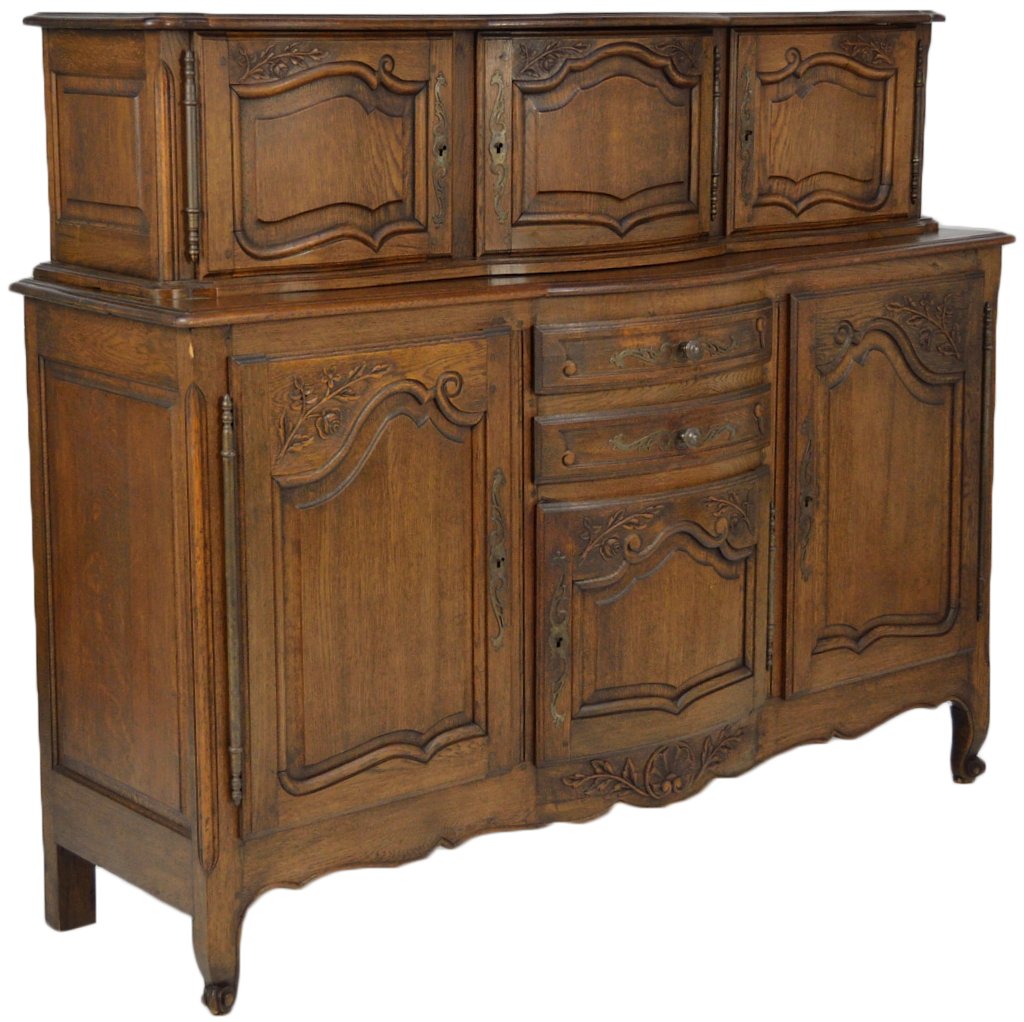 A GOOD 19TH CENTURY OAK LOUIS XV STYLE ENFILADE BU: A GOOD 19TH CENTURY OAK LOUIS XV STYLE ENFILADE BUFFET Aged to a rich warm brown patina, this buffet features beautifully scalloped and shaped raised panel doors, with a rolled edge and each with a ca