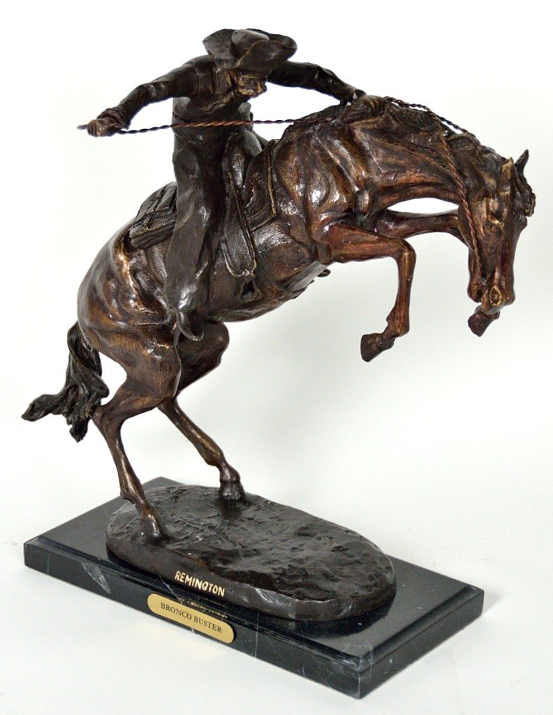 "BRONCO BUSTER" BY FREDRIC REMINGTON A RECAST BRONZ: ""BRONCO BUSTER"" BY FREDRIC REMINGTON A RECAST BRONZE 20th Century Frederic Remington produced the approximate 22 inch size Broncho Buster bronze sculpture statue in 1895 using the sand casting techn