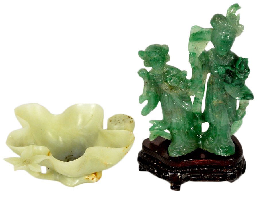 A LOT OF TWO CHINESE JADE CARVINGS: A LOT OF TWO CHINESE JADE CARVINGS The first being an apple green jadeite double figure of a mother and daughter dressed in robes and carrying flowers and a fan or whisk, with a conforming pierced woo