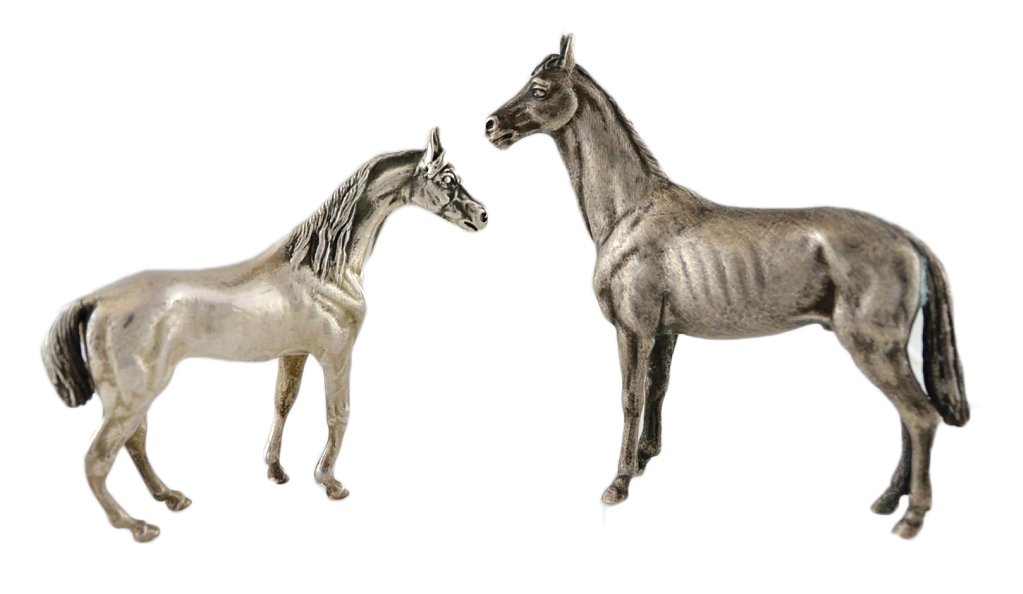 TWO SMALL SILVER HORSES INCLUDING BUCCELLATI: TWO SMALL SILVER HORSES INCLUDING BUCCELLATI 20th Century Italian and Austrian. The larger horse of .800 sterling silver by M. Buccellati; the smaller Austrian one of nickel silver, no assay mark; bot
