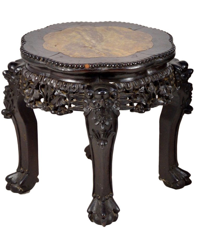 ANTIQUE CHINESE STYLE CARVED ROSEWOOD AND MARBLE P: ANTIQUE CHINESE STYLE CARVED ROSEWOOD AND MARBLE POT STAND Late 19th Century An elaboratly carved rosewood frame with beaded edge, pierced and carved apron on ball and claw cabriole legs. An inset top