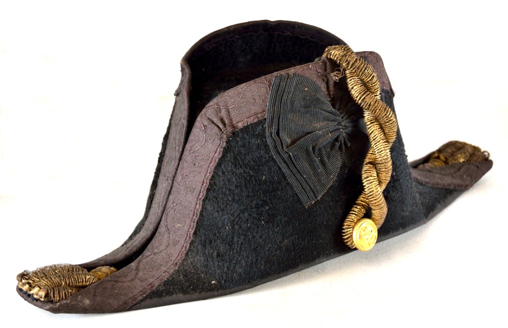 ANTIQUE ENGLISH ROYAL NAVY BICORNE HAT IN FITTED M: ANTIQUE ENGLISH ROYAL NAVY BICORNE HAT IN FITTED METAL CASE Late 18th - early 19th Century The hat, known as a "Bicorne", with black plush body, "beaver", with embroidered black tape edging and gold b