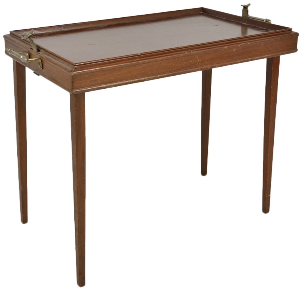 A PORTABLE MAHOGANY FOLDING TRAY TABLE: A PORTABLE MAHOGANY FOLDING TRAY TABLE 1st quarter 20th Century 25½ x 32 x 17½ inches