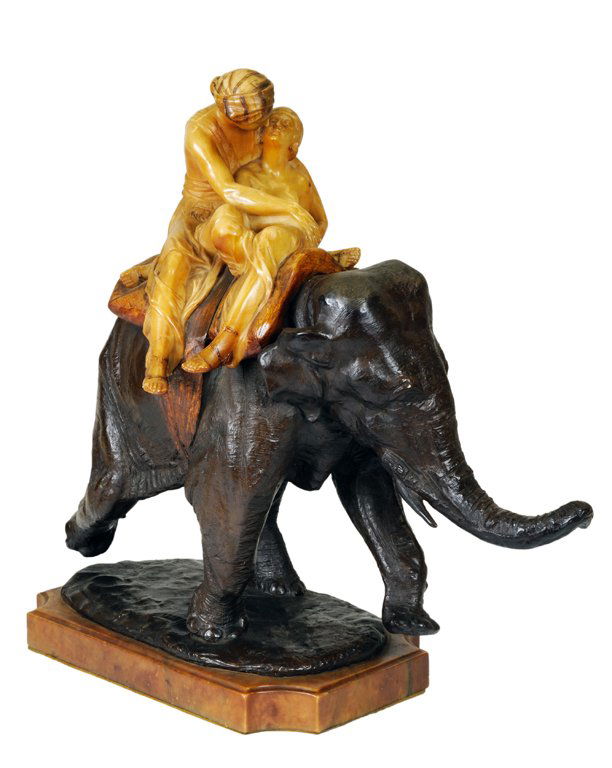 A FIGURAL BRONZE AND ALABASTER SCULPTURE OF AN ELE: A FIGURAL BRONZE AND ALABASTER SCULPTURE OF AN ELEPHANT France, Circa 1925, Attributed Sirio Tofanari. Attributed to Sirio Tofanari (1886-1969). The exquisitely cast Asian elephant cantering with pres