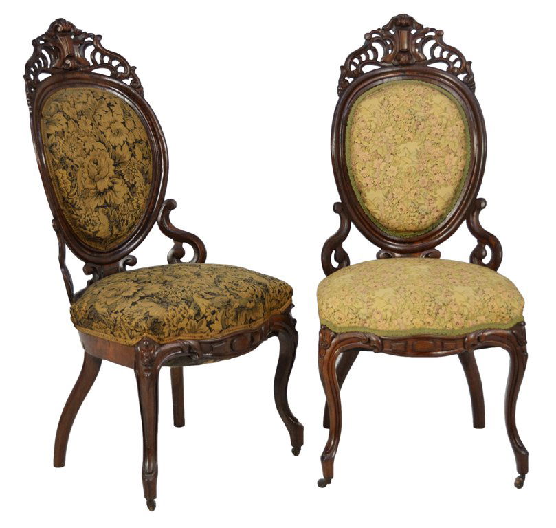 A PAIR OF ROCOCO REVIVAL CARVED AND LAMINATED ROSE: A PAIR OF ROCOCO REVIVAL CARVED AND LAMINATED ROSEWOOD SIDE CHAIRS Attributed to John Henry Belter, New York, Circa 1860. The Victorian rococo laminated rosewood side chairs are finely carved with lam