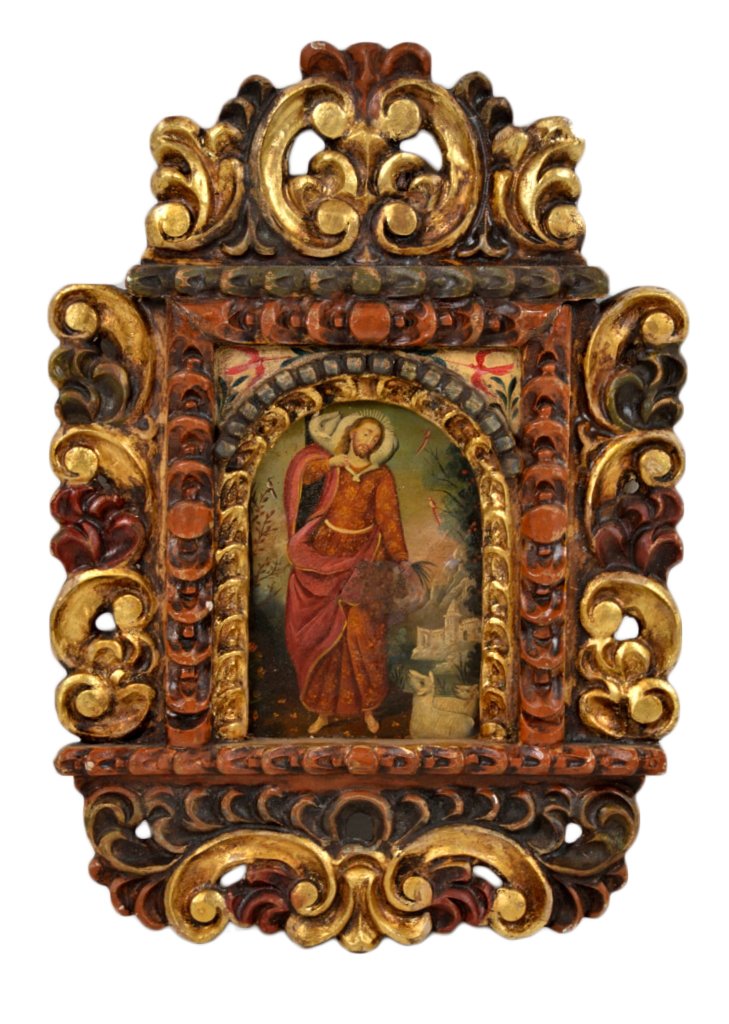 AN ANTIQUE SPANISH COLONIAL CUZCO SCHOOL STYLE PAI: AN ANTIQUE SPANISH COLONIAL CUZCO SCHOOL STYLE PAINTING Possibly 19th Century The oil-on-tin painting depicting Christ, the Lamb of God; in an elaborate arched gilded and painted pierce-carved wood ni