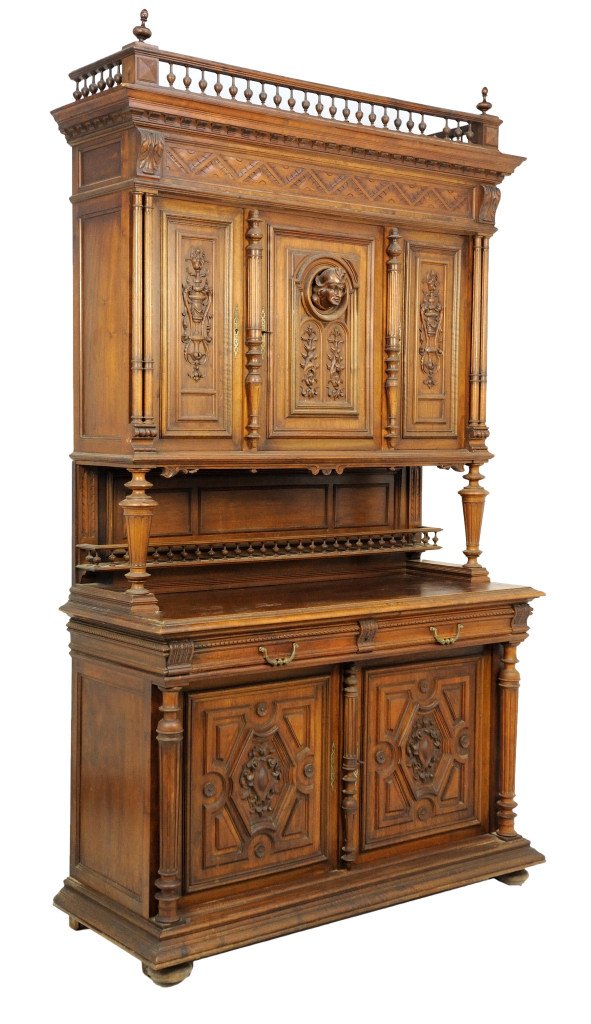HENRI II STYLE CARVED WALNUT CREDENZA: HENRI II STYLE CARVED WALNUT CREDENZA 19th Century The lower doors feature a cabachon cartouche surrounded by lozenge panels, above the center door having a carved head peering from a portal and arabe
