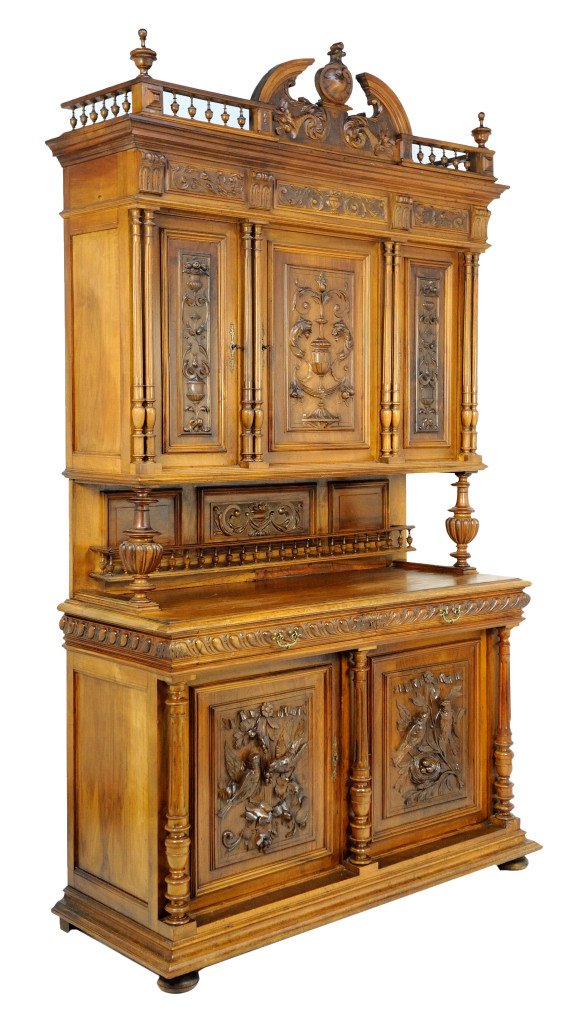 HENRI II STYLE HAND CARVED WALNUT CREDENZA: HENRI II STYLE HAND CARVED WALNUT CREDENZA 19th Century Exquisite carvings of birds and nested eggs decorate the lower door panels, with an arabesque of urn and foliate on each of the three doors abov