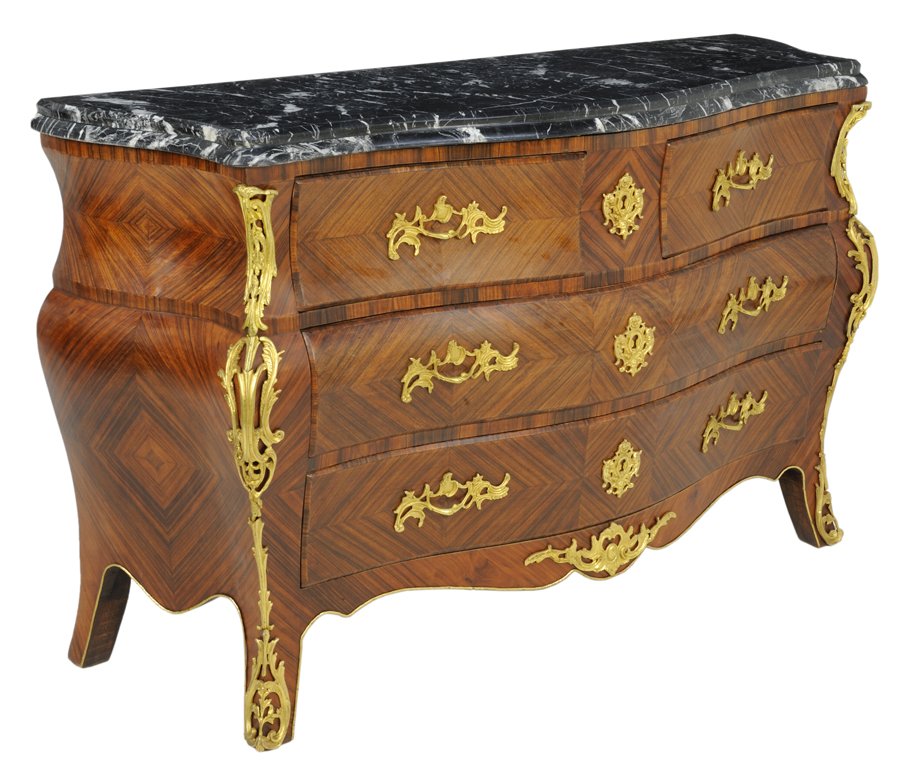 A LOUIS XV STYLE ROSEWOOD COMMODE WITH ORMOLU MOUN: A LOUIS XV STYLE ROSEWOOD COMMODE WITH ORMOLU MOUNTS 20th Century The shaped black marble top with white veining and complex edge detail is supported by a bombe form body veneered with rosewood in a c