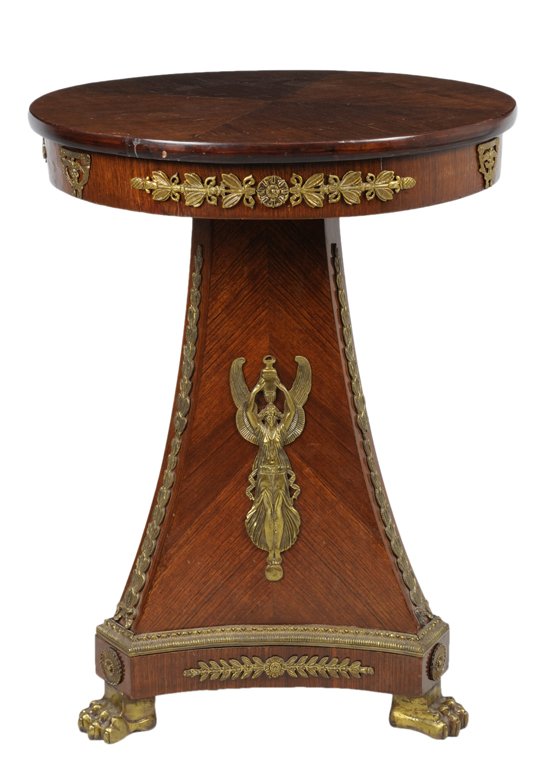 A CIRCULAR EMPIRE STYLE ROSEWOOD GUERIDON WITH BRO: A CIRCULAR EMPIRE STYLE ROSEWOOD GUERIDON WITH BRONZE MOUNTS 20th Century The circular top with pin wheel veneer supported by recessed apron featuring pierced cast ormolu mounts above a flaring tripar