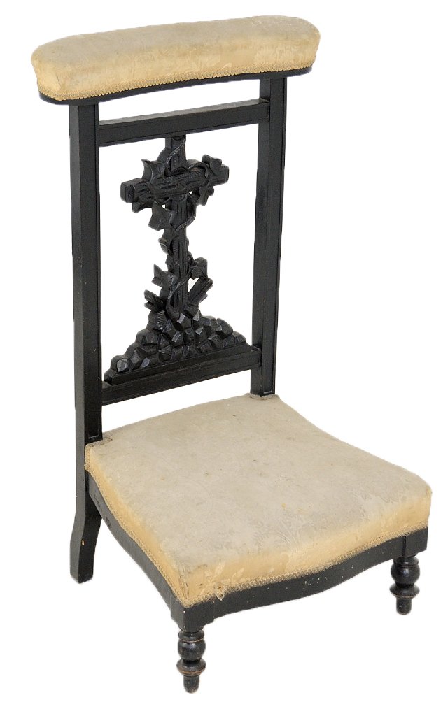 ANTIQUE HAND CARVED WALNUT PRIE-DIEU: ANTIQUE HAND CARVED WALNUT PRIE-DIEU 19th Century Ebonized frame with turned final style feet, elaborately carved center back splat features a cross with trailing vines on a rocky out cropping. 35 x 1