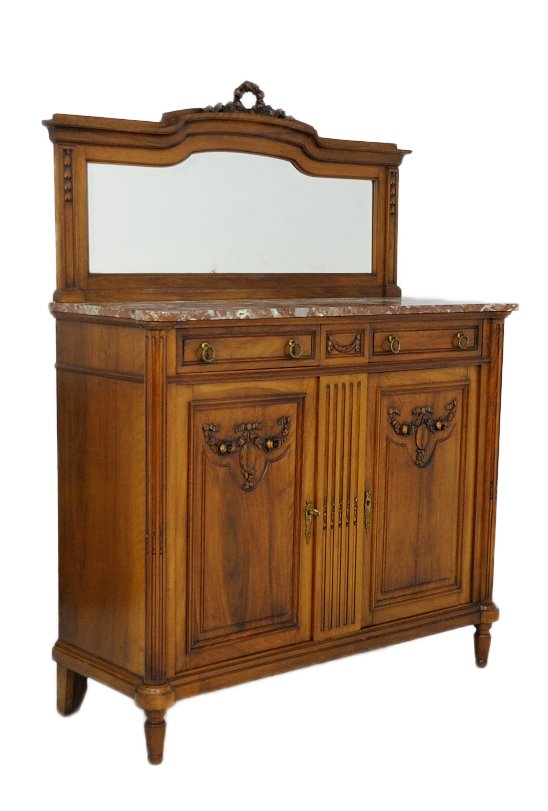 LOUIS XVI STYLE CARVED OAK SIDEBOARD: LOUIS XVI STYLE CARVED OAK SIDEBOARD Early 20th Century The base cabinet having double doors, each with a drawer above and all with floral and foliate accent carvings. The serving deck, with variegate