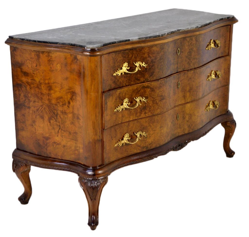 VENETIAN FIGURED WALNUT COMMODE: VENETIAN FIGURED WALNUT COMMODE Early 20th Century Three drawers with serpentine shaping, side panels with kalaidascope veneers, inset marble top, bronze dore hardware, raised on shaped base with cabr