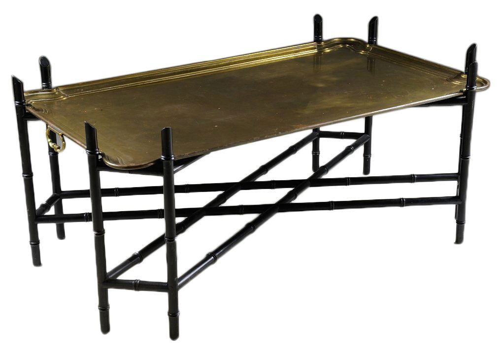 FAUX BAMBOO TRAY TOP COCKTAIL TABLE: FAUX BAMBOO TRAY TOP COCKTAIL TABLE 20th Century Black iron faux bamboo frame with large fitted brass tray top. 21½ x 47½ x 26½ inches