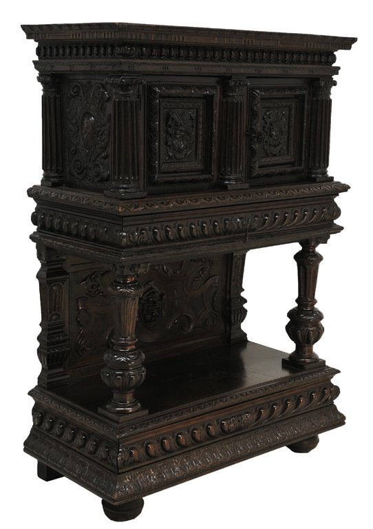 A ITALIAN WALNUT RENAISSANCE STYLE CABINET ON STAN: A ITALIAN WALNUT RENAISSANCE STYLE CABINET ON STAND Early 19th Century A rectilinear fluted cornice above a recessed frieze of carved egg cartouches is supported by three reeded columns with Corinthia