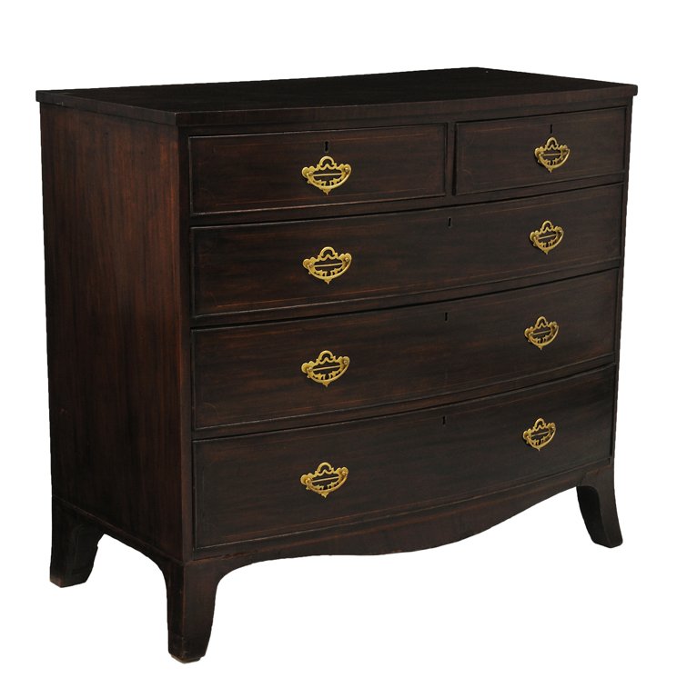 A SHERATON MAHOGANY BOW FRONT CHEST OF DRAWERS Ear: A SHERATON MAHOGANY BOW FRONT CHEST OF DRAWERS Early 19th Century The mahogany top with crescent front is supported by a recessed conforming body featuring five locking drawers with raised beaded edge