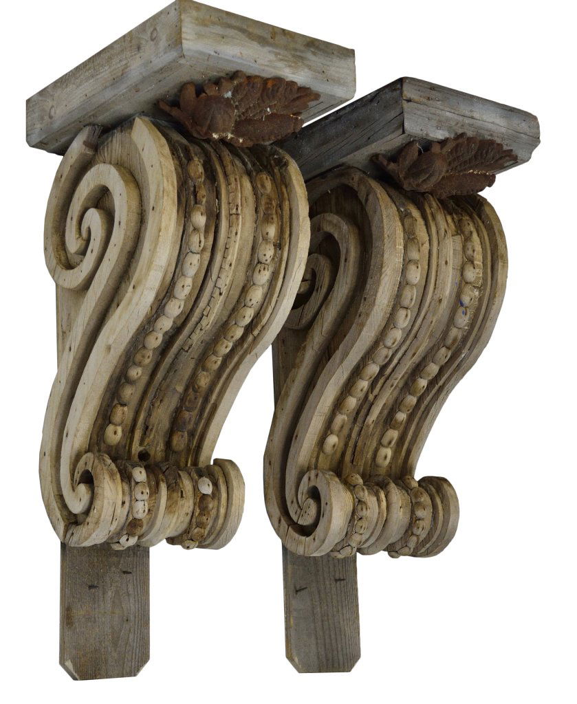 ANTIQUE ARCHITECTURAL BRACKETS: ANTIQUE ARCHITECTURAL BRACKETS 19TH Century Carved volute scroll brackets with beaded detail, mounted to ""L"" frame wood stands and each with an added iron embellishment. 34½ x 11½ x 16 inches