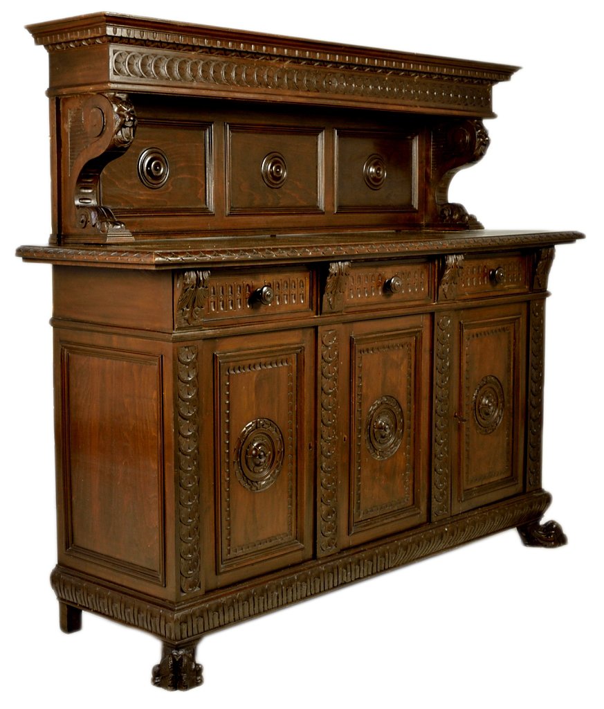 RENAISSANCE REVIVAL STYLE WALNUT SIDEBOARD: RENAISSANCE REVIVAL STYLE WALNUT SIDEBOARD Early 20th Century A triple door and drawer base, with a triple paneled backsplash having a ""canopy"" shelf, raised above on substantial, mask and paw carve
