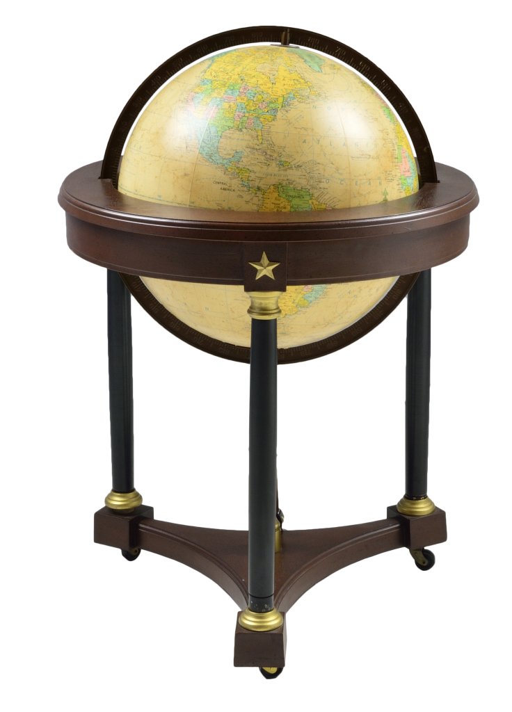 FLOOR GLOBE ON EMPIRE STYLE STAND: FLOOR GLOBE ON EMPIRE STYLE STAND 20th Century A nice world globe lamp on empire stand, ebonized wood columns with brass mounts, connect the incurved base on wheels and the mahogany stained ring holdi