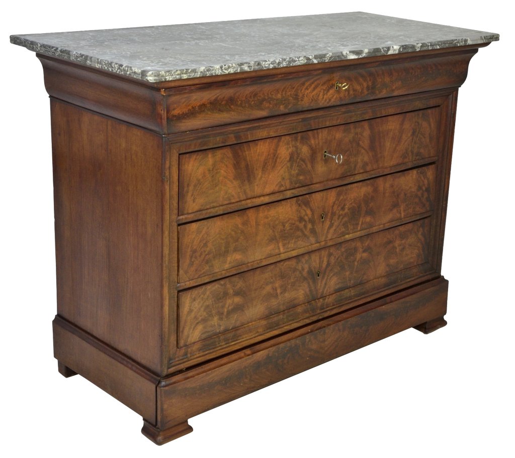 LOUIS PHILIPPE STYLE WALNUT COMMODE: LOUIS PHILIPPE STYLE WALNUT COMMODE France, 19th Century A five drawer commode of figural walnut with concealed apron drawer and integrated frieze drawer, variegated marble top, raised on shaped block