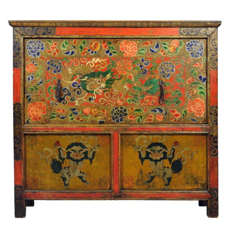 A RARE TIBETAN ANTIQUE LAMASERY CABINET Lhasa, Tibe: A RARE TIBETAN ANTIQUE LAMASERY CABINET Lhasa, Tibet, 19th Century Mortise-tenon construction with beveled panels inserted into a tongue-and-groove framework, hand-painted cabinet. Upper panel, with d