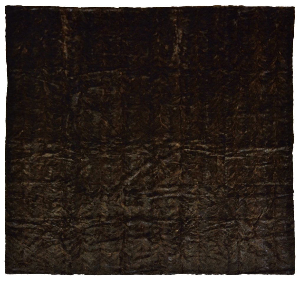 KING SIZE MAHOGANY MINK THROW: KING SIZE MAHOGANY MINK THROW 20th Century A large square throw or coverlet made of deep brown mink pieces from Scandinavia, lined with matching satin, sewn in a trellis pattern; labeled to the revers