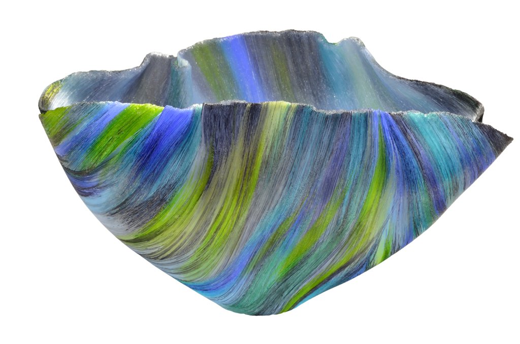 (MARY ANN) TOOTS ZYNSKY, (American 1951-). "PRELU: (MARY ANN) TOOTS ZYNSKY, (American 1951-)."PRELUDIO", 2003. Fused, thermoformed glass vessel with wavy rim and undulating sides, composed of a series of vibrant shades of blue, green, lime and turquoi