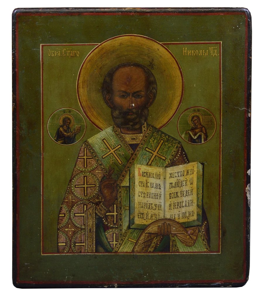 ANTIQUE RUSSIAN ICON OF ST. NICHOLAS: ANTIQUE RUSSIAN ICON OF ST. NICHOLAS 19th Century. The icon depicts St. Nicholas flanked by Christ and the Virgin; painted in egg tempera and gilding on wood panel. 12 ½ x 10 ¼ x 1 inch.