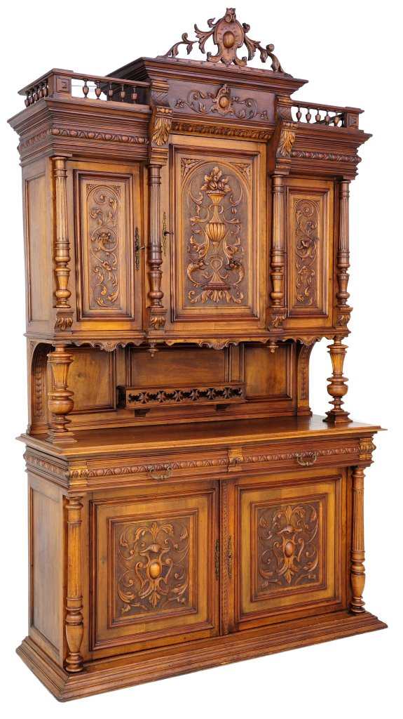 ANTIQUE FRENCH VICTORIAN BUFFET: ANTIQUE FRENCH VICTORIAN BUFFET 19th Century, France This walnut buffet is crowned by a pierce carved acanthus cabochon medallion and spandrel with a duplicate theme in frieze. Three scrolling acanthu