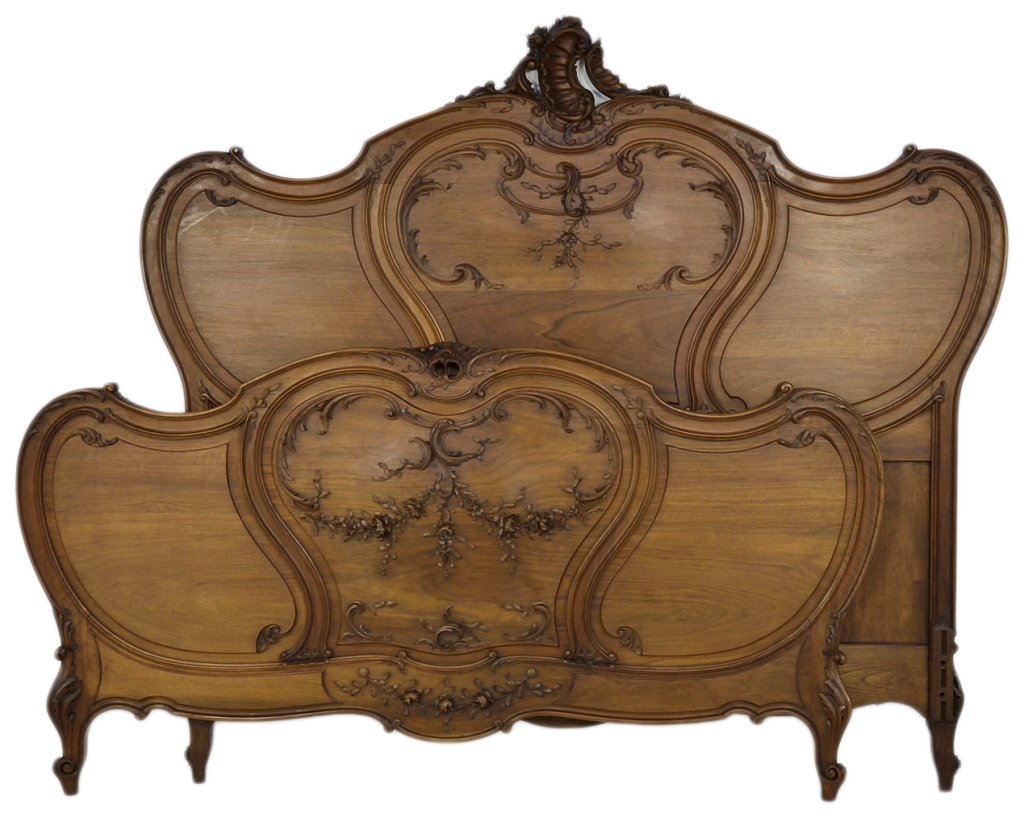 A FINE LOUIS XV STYLE BED: A FINE LOUIS XV STYLE BED Early 20th Century, France In the distinct Louis XV style, this bed is crowned by a carved scrolling acanthus arch and is flanked by a carved bud garland, having beautifully 