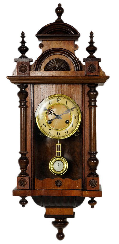 ANTIQUE FRENCH VICTORIAN STYLE WALL CLOCK: ANTIQUE FRENCH VICTORIAN STYLE WALL CLOCK 19th Century, France An antique walnut wall clock, crowned by an arch top pediment having a shell at center, flanked by two finials, carved rosettes and turne