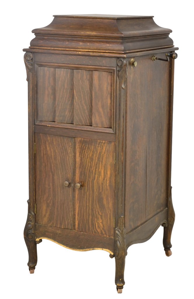 ANTIQUE COLOMBIA GRAMAPHONE: ANTIQUE COLOMBIA GRAMAPHONE First quarter 20th Century, Bridgeport, Connecticut The gramaphone is housed in a French provincial cabinet, having a carved wood stepped turn table lid, adjustable acousti