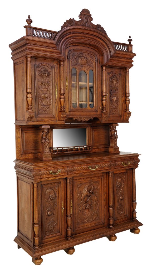 FRENCH VICTORIAN STYLE BUFFET: FRENCH VICTORIAN STYLE BUFFET 20th Century, France The solid oak buffet is topped by a carved acanthus arch top and pierce cut gadrooned spandrel with stepped frieze, three fruit and foliate carved pa