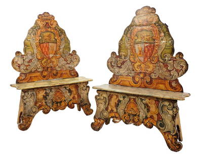 A PAIR OF LONG ANTIQUE ITALIAN POLYCHROMED SCABELLO: A PAIR OF LONG ANTIQUE ITALIAN POLYCHROMED SCABELLOS 18th Century The shaped straight backs are exuberantly painted with scrollwork and heraldic shields with crests. The crests are surrounded by burgu