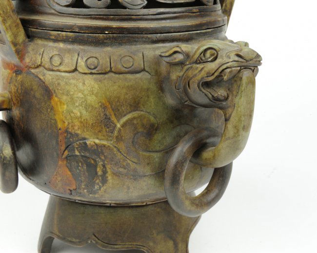 AN ANTIQUE CARVED STONE INCENSE BURNER Lot 113