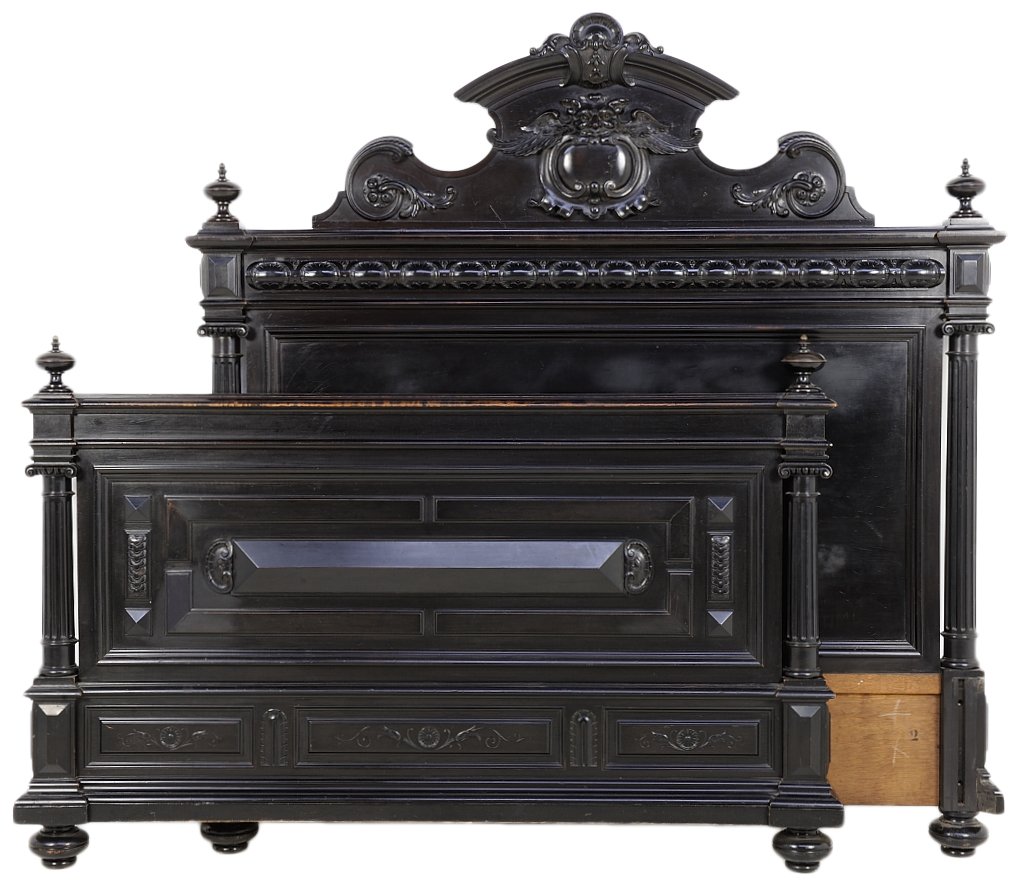 AN ANTIQUE FRENCH NEOCLASSICAL STYLE EBONIZED BED WITH : AN ANTIQUE FRENCH NEOCLASSICAL STYLE EBONIZED BED WITH GARGOYLE AND SHELL CARVINGS Early 20th Century, France A striking antique French Neoclassical style bed is ebonized, crowned by a shell and gargo