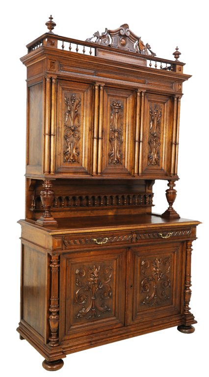 A FRENCH VICTORIAN HENRI II STYLE BUFFET WITH FRUIT AND: A FRENCH VICTORIAN HENRI II STYLE BUFFET WITH FRUIT AND GARGOYLE Late 19th Century, France A fine French Victorian style buffet is crowned by a shell and cabochon medallion, lion flanked arch and span